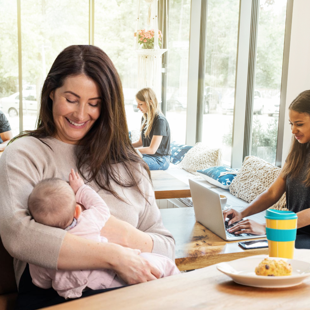 Breast Vest in Black on breastfeeding mum in cafe and breastfeeding